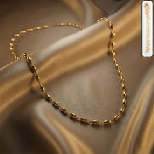 Golden oval beaded chain necklace
